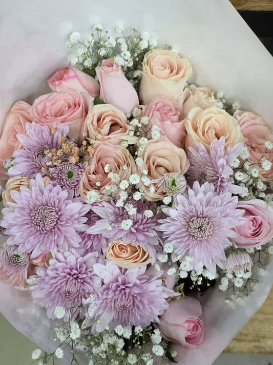 VeryKenyan bouquet of pink and purple flowers with baby's breath